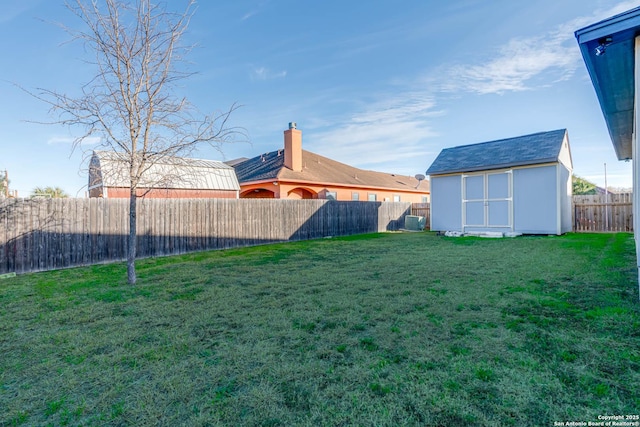 8314 Marek, San Antonio, TX 78224 - view of yard featuring a fenced backyard, a shed, and an outbuilding