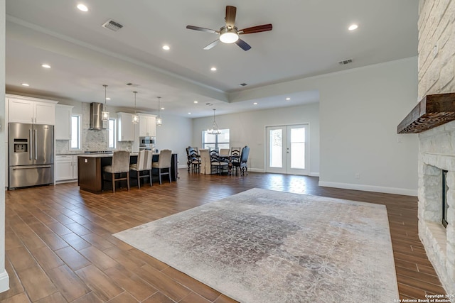 8314 Marek, San Antonio, TX 78224 - living area featuring visible vents, ornamental molding, ceiling fan, recessed lighting, and dark wood finished floors