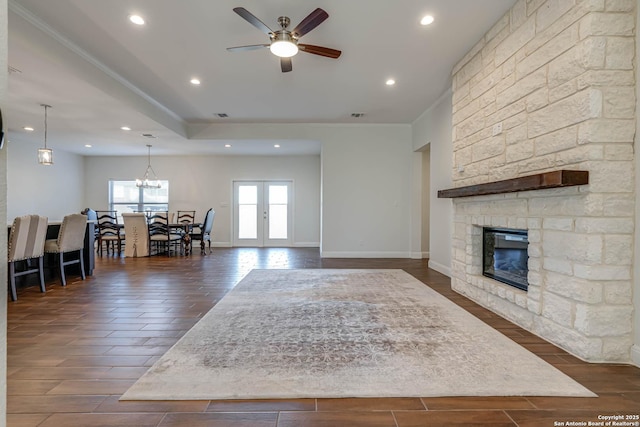 8314 Marek, San Antonio, TX 78224 - living area featuring ornamental molding, a fireplace, a ceiling fan, and dark wood-style floors