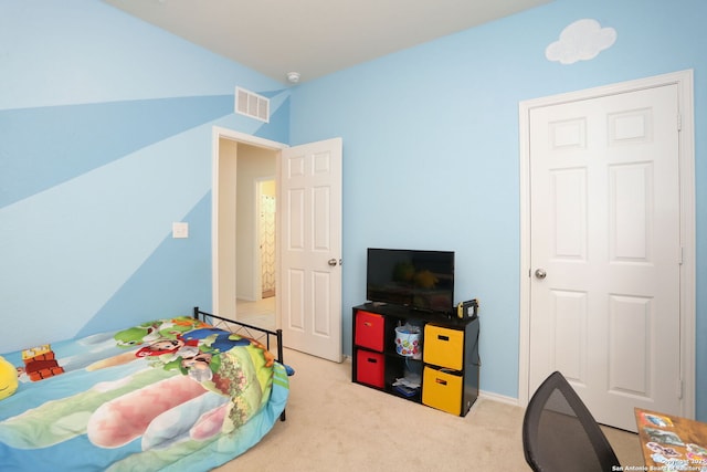 bedroom featuring carpet floors and visible vents