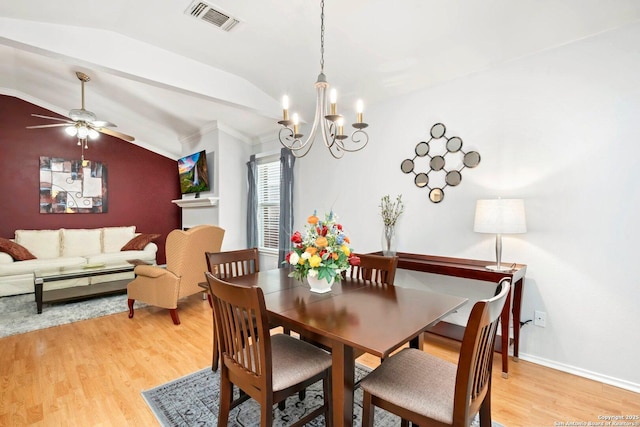 9503 Kirk Pond, San Antonio, TX 78240 - dining space with vaulted ceiling, light wood-style floors, ceiling fan, a chandelier, and baseboards