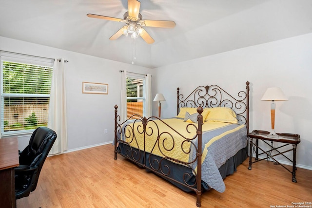 9503 Kirk Pond, San Antonio, TX 78240 - bedroom featuring light wood-style flooring, baseboards, ceiling fan, and a desk