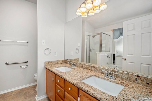 9503 Kirk Pond, San Antonio, TX 78240 - full bathroom featuring baseboards, a stall shower, double vanity, and toilet