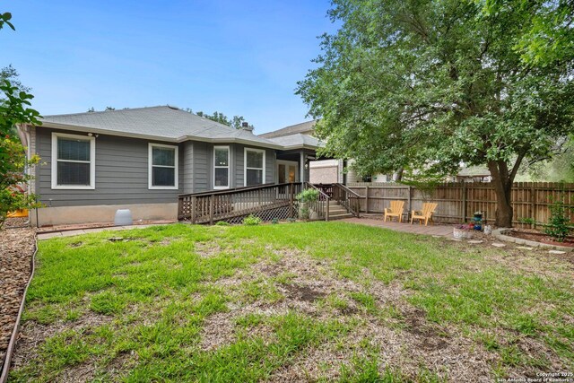 9503 Kirk Pond, San Antonio, TX 78240 - rear view of house featuring a wooden deck and a patio