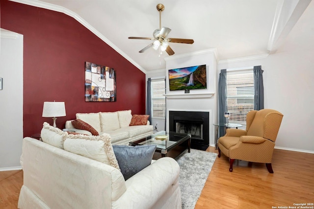 9503 Kirk Pond, San Antonio, TX 78240 - living area with light wood-style floors, lofted ceiling, a ceiling fan, a fireplace with flush hearth, and baseboards