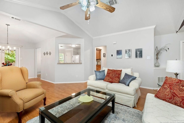 9503 Kirk Pond, San Antonio, TX 78240 - living area featuring lofted ceiling, a ceiling fan, wood finished floors, a chandelier, and baseboards
