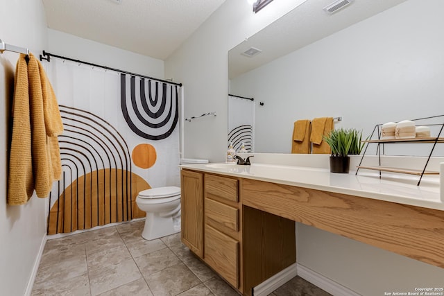 bathroom featuring toilet, a shower with curtain, visible vents, and vanity