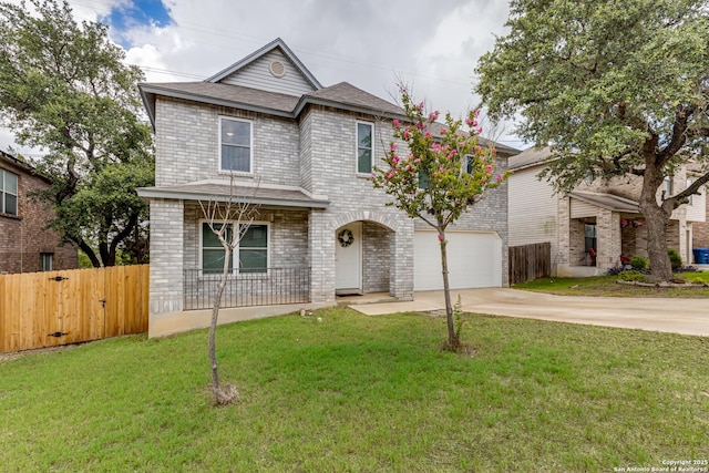 traditional home featuring brick siding, an attached garage, fence, and concrete driveway
