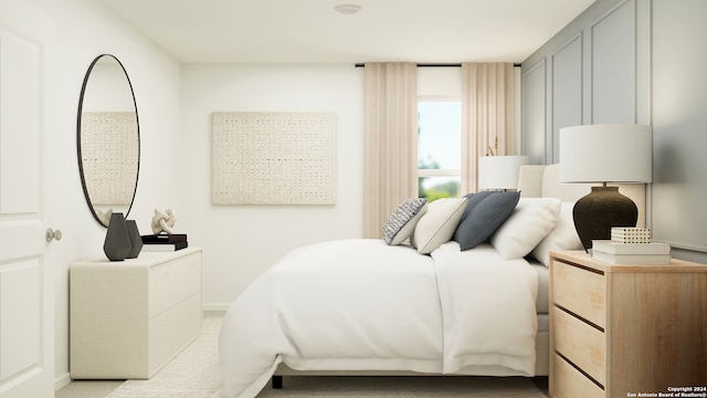 carpeted bedroom with baseboards