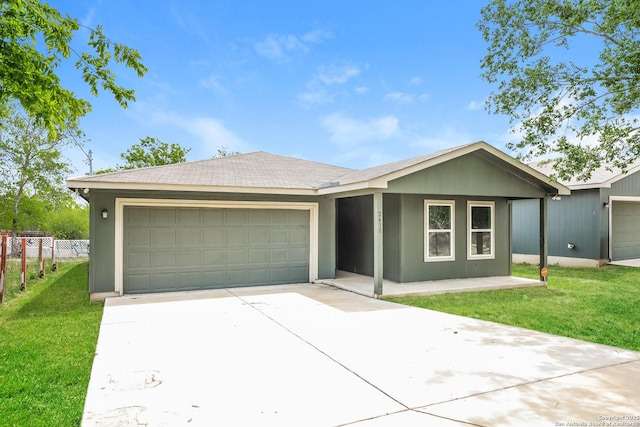 2430 Bermuda, San Antonio, TX 78222 - single story home with fence, an attached garage, driveway, and a front lawn
