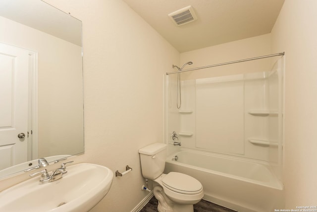 2430 Bermuda, San Antonio, TX 78222 - full bath featuring a sink, toilet, baseboards, wood finished floors, and visible vents