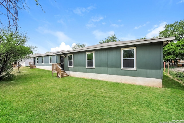 2430 Bermuda, San Antonio, TX 78222 - rear view of house featuring a lawn