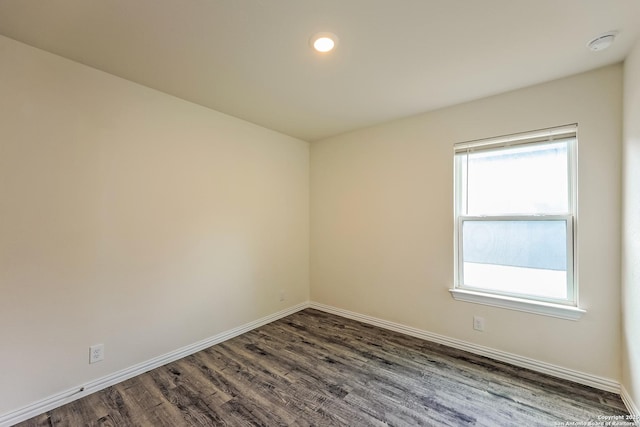 2430 Bermuda, San Antonio, TX 78222 - unfurnished room with recessed lighting, baseboards, and dark wood finished floors