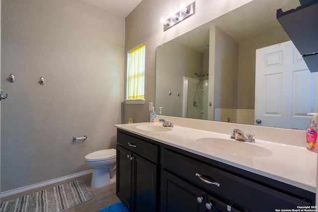 full bath featuring double vanity, toilet, a sink, and a shower