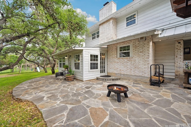 7904 N Verde, San Antonio, TX 78240 - view of patio featuring a fire pit