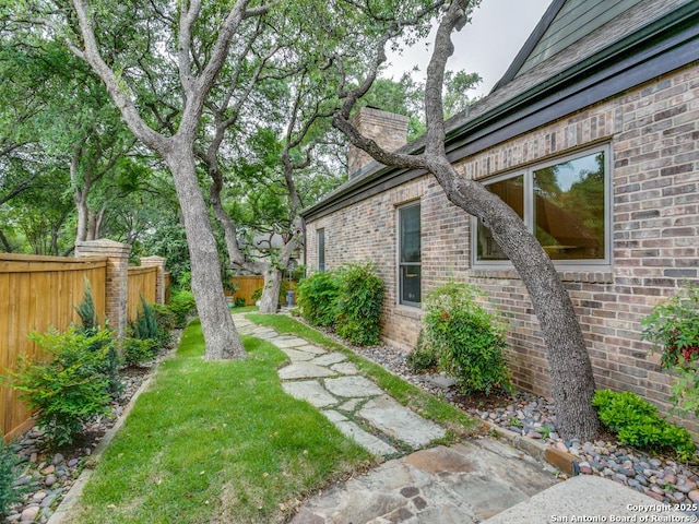view of yard with fence