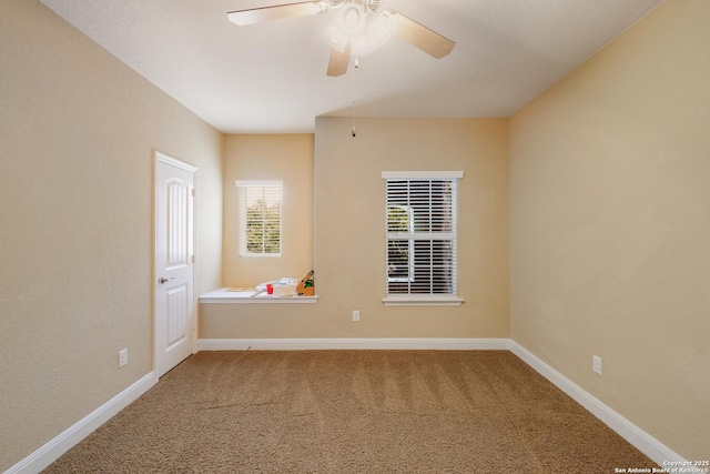 12422 Caprock Crk, San Antonio, TX 78254 - carpeted empty room with baseboards and a ceiling fan