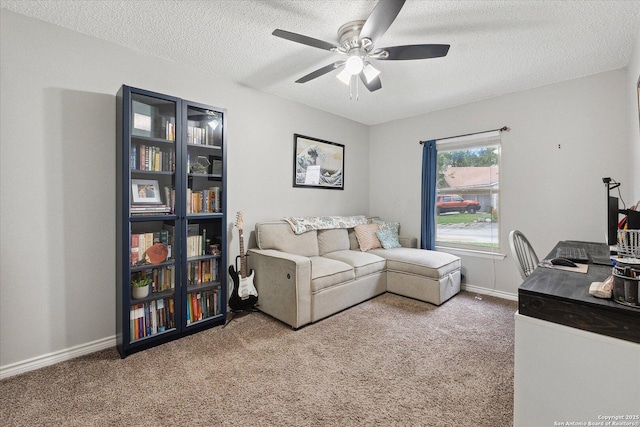 6927 Country Rose, San Antonio, TX 78240 - carpeted living room with baseboards, a ceiling fan, and a textured ceiling