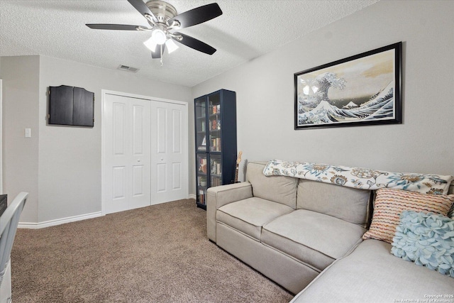 6927 Country Rose, San Antonio, TX 78240 - living room featuring carpet floors, a textured ceiling, visible vents, and ceiling fan