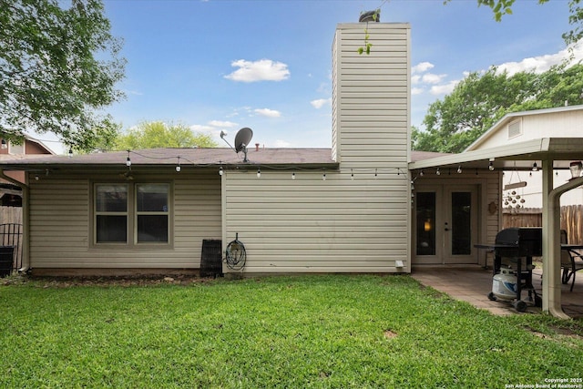 6927 Country Rose, San Antonio, TX 78240 - rear view of property featuring french doors, fence, a chimney, and a yard