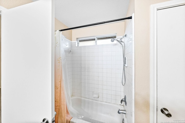 full bath with shower / bath combination with curtain