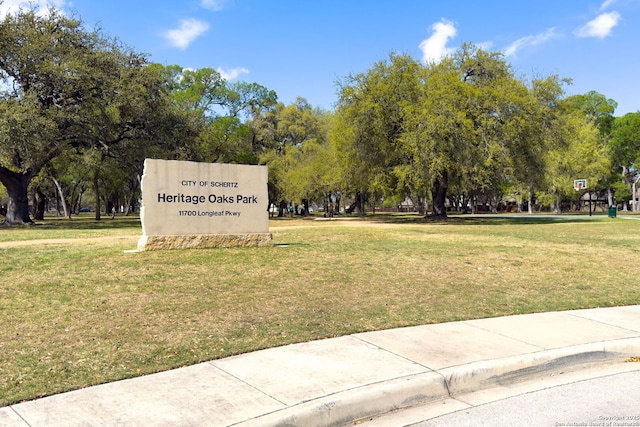 surrounding community featuring a lawn