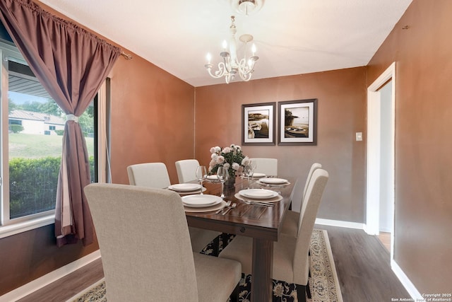 239 Sharon Dr, San Antonio, TX 78216 - dining space with an inviting chandelier, baseboards, and wood finished floors