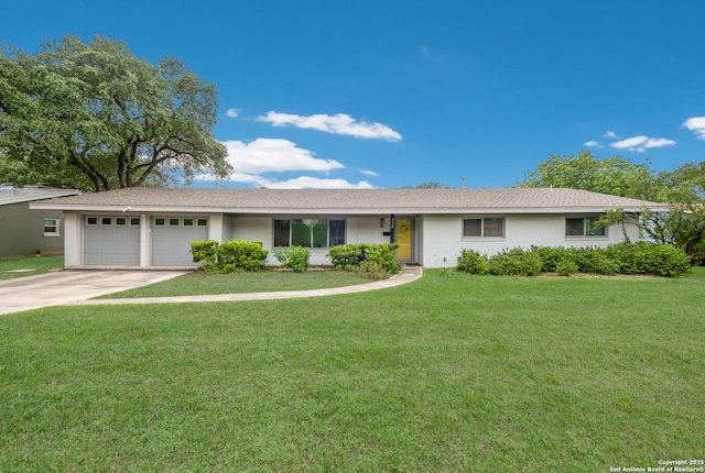 239 Sharon Dr, San Antonio, TX 78216 - single story home with an attached garage, concrete driveway, and a front lawn