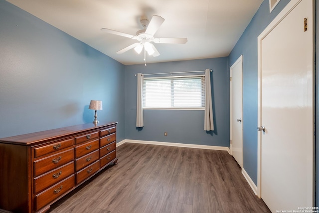 239 Sharon Dr, San Antonio, TX 78216 - bedroom featuring baseboards, ceiling fan, and wood finished floors