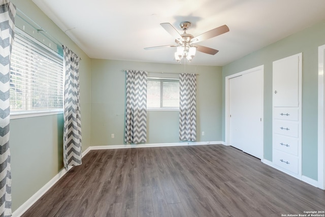 239 Sharon Dr, San Antonio, TX 78216 - unfurnished bedroom featuring baseboards, ceiling fan, wood finished floors, and a closet