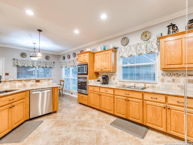 kitchen featuring crown molding, appliances with stainless steel finishes, a healthy amount of sunlight, and tasteful backsplash