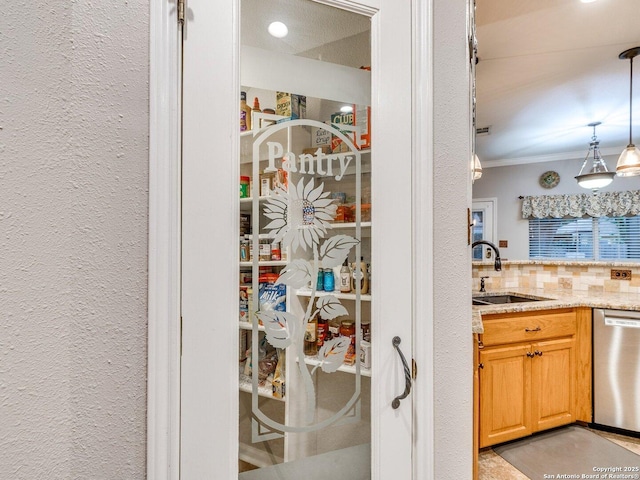 pantry featuring a sink