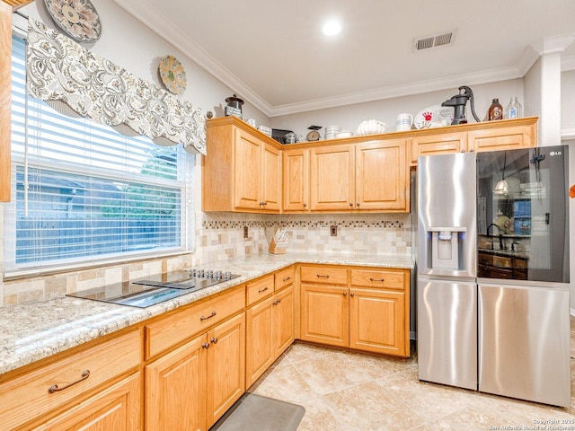 kitchen with crown molding, black electric stovetop, decorative backsplash, stainless steel refrigerator with ice dispenser, and visible vents