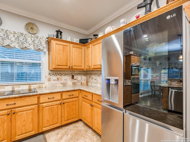 kitchen featuring crown molding, light stone countertops, light tile patterned floors, backsplash, and black appliances