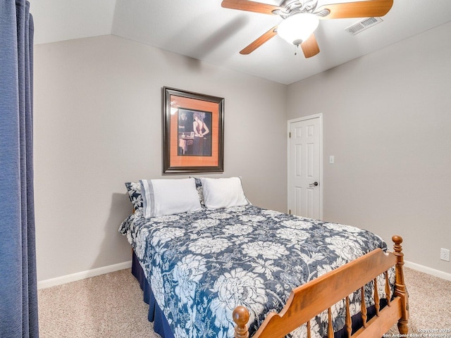 bedroom with carpet floors, a ceiling fan, baseboards, vaulted ceiling, and visible vents
