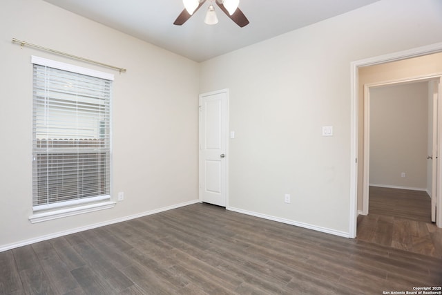 9332 Aggie Run, San Antonio, TX 78254 - unfurnished room featuring baseboards, ceiling fan, and dark wood-style floors