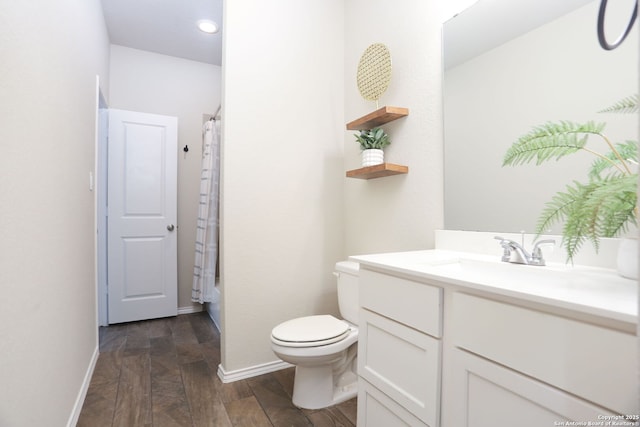9332 Aggie Run, San Antonio, TX 78254 - full bath with vanity, a shower with shower curtain, wood finished floors, and toilet