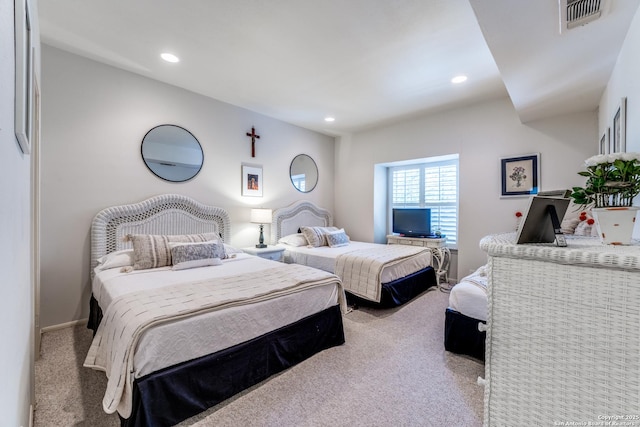 7731 Broadway Unit I-42, San Antonio, TX 78209 - carpeted bedroom with recessed lighting and visible vents