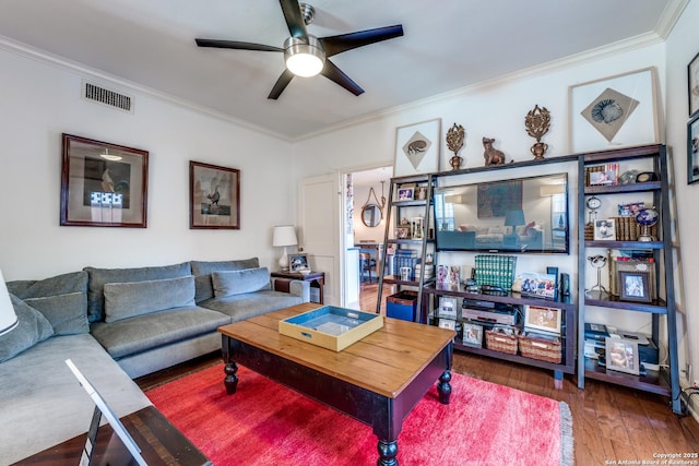 7731 Broadway Unit I-42, San Antonio, TX 78209 - living area featuring visible vents, a ceiling fan, hardwood / wood-style floors, and ornamental molding