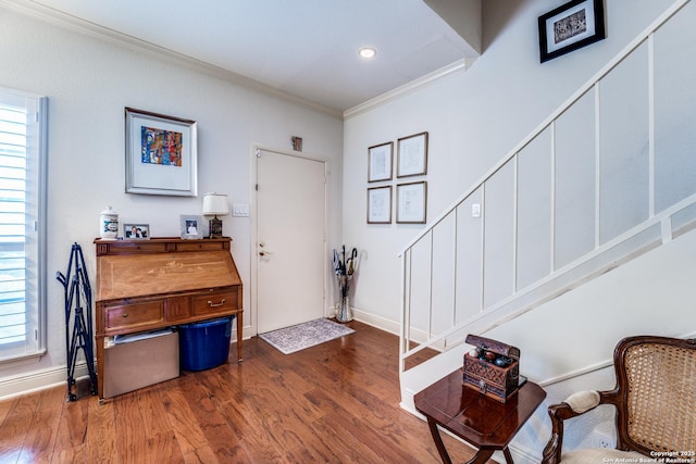 7731 Broadway Unit I-42, San Antonio, TX 78209 - foyer entrance with crown molding, stairs, baseboards, and wood finished floors