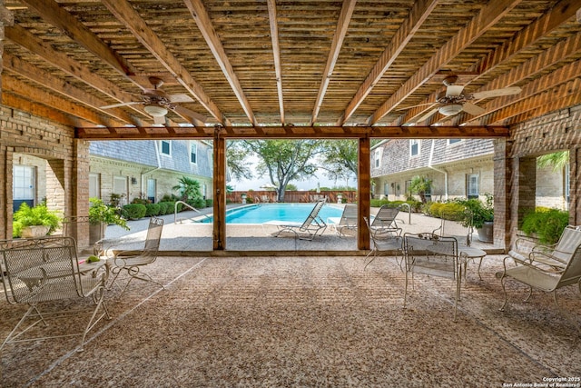 7731 Broadway Unit I-42, San Antonio, TX 78209 - view of patio with fence, a ceiling fan, and a fenced in pool
