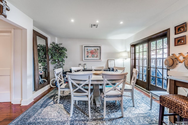 7731 Broadway Unit I-42, San Antonio, TX 78209 - dining room with recessed lighting, baseboards, visible vents, and wood finished floors