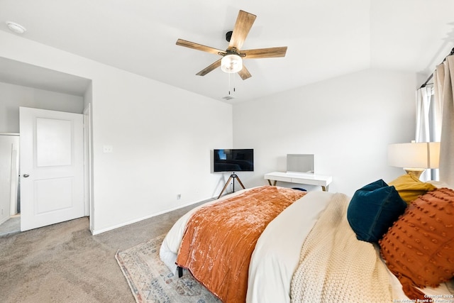 bedroom with carpet floors, a ceiling fan, and baseboards