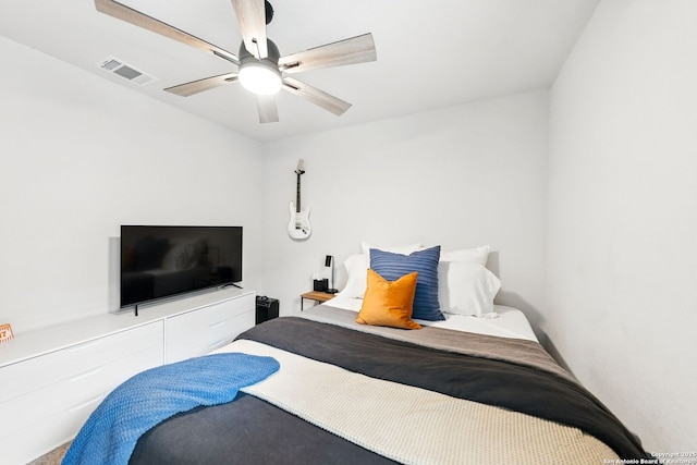 bedroom featuring ceiling fan and visible vents