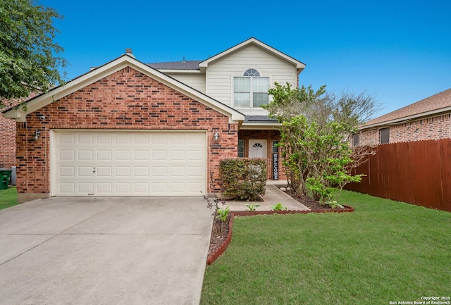 traditional-style home with fence, concrete driveway, a front yard, and brick siding