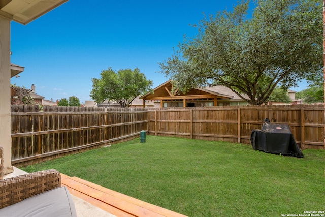view of yard featuring a fenced backyard