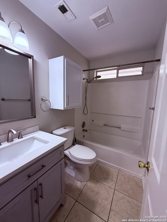 bathroom with vanity, toilet, shower / tub combination, and visible vents