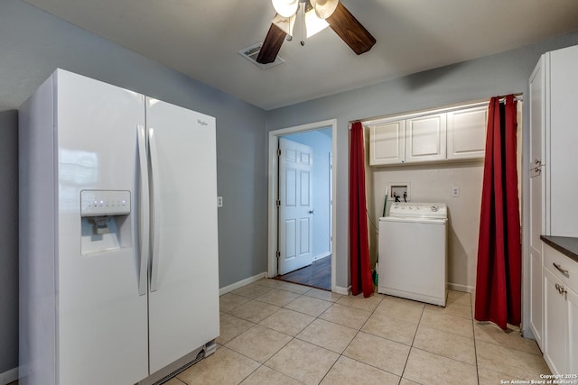 laundry area with visible vents, baseboards, washer / clothes dryer, ceiling fan, and cabinet space