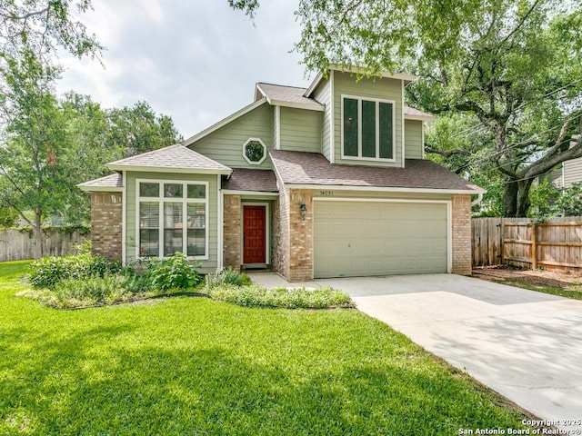 14051 Cedar Cyn, San Antonio, TX 78231 - view of front facade with fence, concrete driveway, a garage, and brick siding