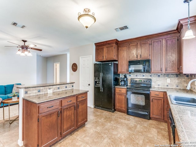 14051 Cedar Cyn, San Antonio, TX 78231 - kitchen featuring backsplash, visible vents, a sink, and black appliances